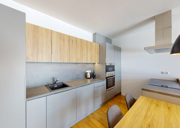 Prenájom - Zariadený 2-izbový byt s veľkým balkónom a garážovým státím v projekte Atrium Living